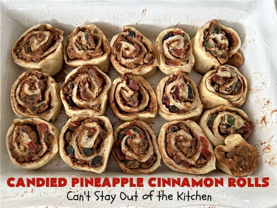 Candied Pineapple Cinnamon Rolls | Can't Stay Out of the Kitchen | These luscious #CinnamonRolls include #CandiedPineapple & they're iced with a thick, drool-worthy #buttercream icing. Every bite will rock your world! Enjoy for a #holiday #breakfast or #brunch. #Thanksgiving #Christmas #ParadiseFruit #pineapple #SweetRolls #HolidayBreakfast
