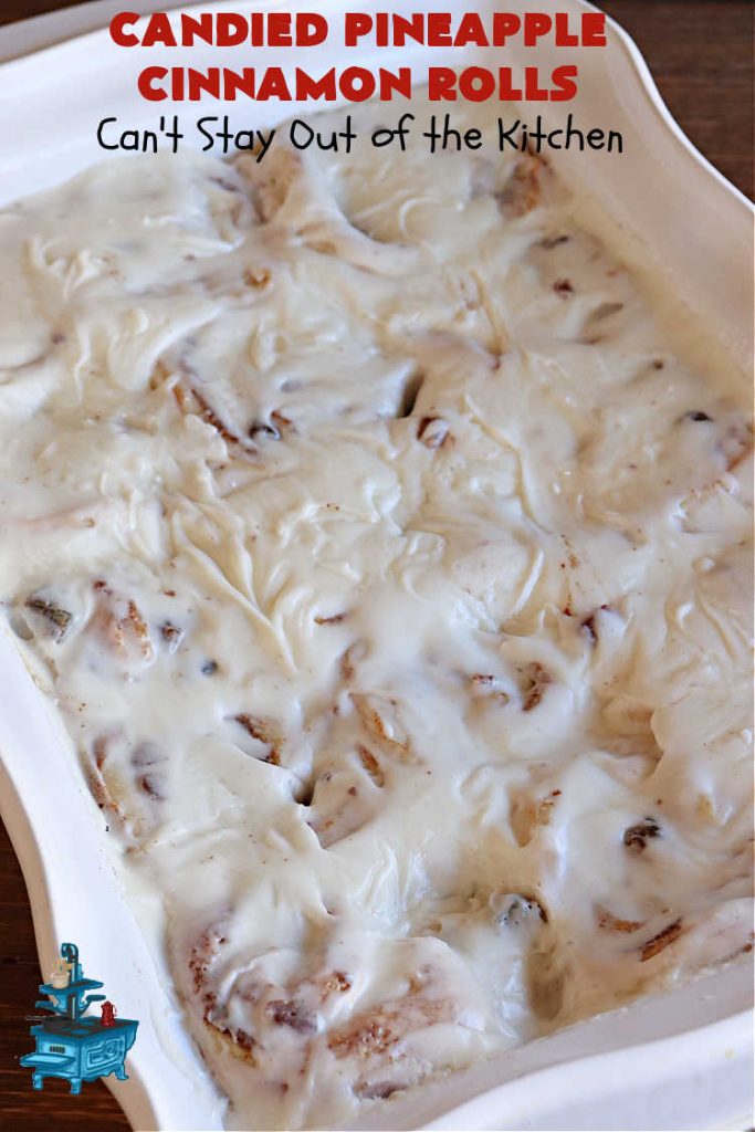 Candied Pineapple Cinnamon Rolls | Can't Stay Out of the Kitchen | These luscious #CinnamonRolls include #CandiedPineapple & they're iced with a thick, drool-worthy #buttercream icing. Every bite will rock your world! Enjoy for a #holiday #breakfast or #brunch. #Thanksgiving #Christmas #ParadiseFruit #pineapple #SweetRolls #HolidayBreakfast