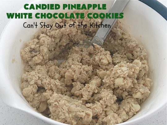 Candied Pineapple White Chocolate Cookies | these delightful #OatmealCookies include #CandiedPineapple & #WhiteChocolateChips for a robust flavor that will knock your socks off! Terrific for #holiday or #tailgating parties or a #ChristmasCookieExchange. #cookies #ParadiseCandiedFruit #chocolate #ParadiseFruitCompany #pineapple #holiday #dessert #HolidayDessert #HolidayBaking #Christmas #Thanksgiving #NewYearsDay #CandiedPineappleWhiteChocolateCookies