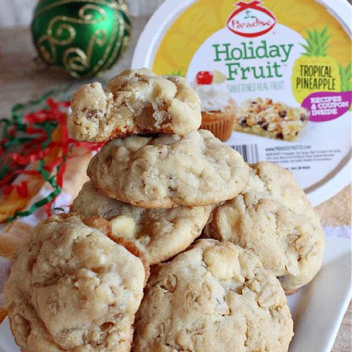 Candied Pineapple White Chocolate Cookies | these delightful #OatmealCookies include #CandiedPineapple & #WhiteChocolateChips for a robust flavor that will knock your socks off! Terrific for #holiday or #tailgating parties or a #ChristmasCookieExchange. #cookies #ParadiseCandiedFruit #chocolate #ParadiseFruitCompany #pineapple #holiday #dessert #HolidayDessert #HolidayBaking #Christmas #Thanksgiving #NewYearsDay #CandiedPineappleWhiteChocolateCookies