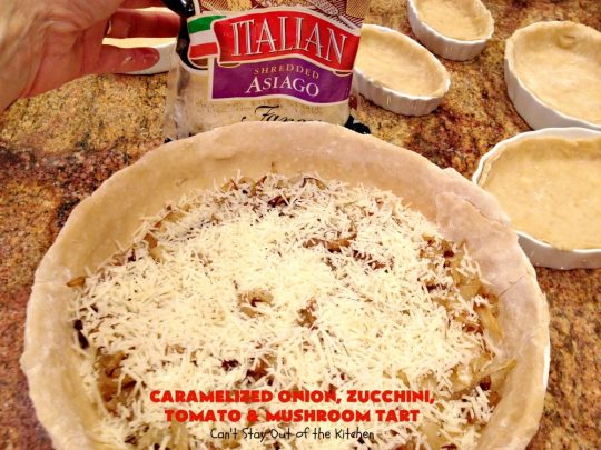 Caramelized Onion, Zucchini, Tomato and Mushroom Tart | Can't Stay Out of the Kitchen | this lovely, mouthwatering tart is filled with #tomatoes, #zucchini, #mushrooms, #CaramelizedOnions & 4 kinds of #cheese. Terrific for a #holiday or company #breakfast or for a #MeatlessMonday entree. #FontinaCheese #ParmesanCheese #AsiagoCheese #RomanoCheese #CaramelizedOnionZucchiniTomatoAndMushroomTart