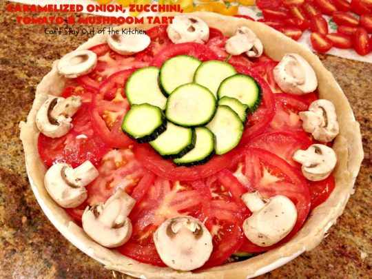 Caramelized Onion, Zucchini, Tomato and Mushroom Tart | Can't Stay Out of the Kitchen | this lovely, mouthwatering tart is filled with #tomatoes, #zucchini, #mushrooms, #CaramelizedOnions & 4 kinds of #cheese. Terrific for a #holiday or company #breakfast or for a #MeatlessMonday entree. #FontinaCheese #ParmesanCheese #AsiagoCheese #RomanoCheese #CaramelizedOnionZucchiniTomatoAndMushroomTart