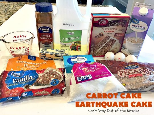 Carrot Cake Earthquake Cake | Can't Stay Out of the Kitchen | this fantastic #cake is rich, decadent & divine! It's layered with #pecans, #coconut, vanilla chips & uses a boxed #carrotcake mix. Then it has a #cheesecake icing layer that sinks into the #dessert while baking. The explosion causes an earthquake! Amazing dessert for company or #holidays.
