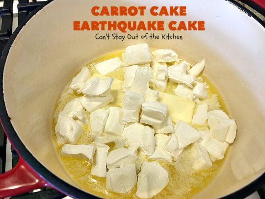Carrot Cake Earthquake Cake | Can't Stay Out of the Kitchen | this fantastic #cake is rich, decadent & divine! It's layered with #pecans, #coconut, vanilla chips & uses a boxed #carrotcake mix. Then it has a #cheesecake icing layer that sinks into the #dessert while baking. The explosion causes an earthquake! Amazing dessert for company or #holidays.