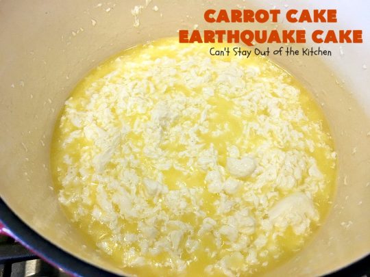 Carrot Cake Earthquake Cake | Can't Stay Out of the Kitchen | this fantastic #cake is rich, decadent & divine! It's layered with #pecans, #coconut, vanilla chips & uses a boxed #carrotcake mix. Then it has a #cheesecake icing layer that sinks into the #dessert while baking. The explosion causes an earthquake! Amazing dessert for company or #holidays.