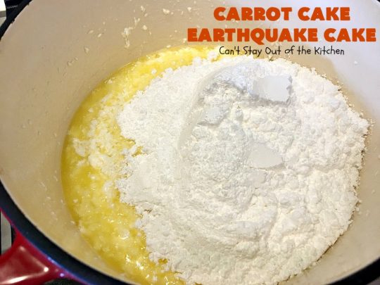 Carrot Cake Earthquake Cake | Can't Stay Out of the Kitchen | this fantastic #cake is rich, decadent & divine! It's layered with #pecans, #coconut, vanilla chips & uses a boxed #carrotcake mix. Then it has a #cheesecake icing layer that sinks into the #dessert while baking. The explosion causes an earthquake! Amazing dessert for company or #holidays.