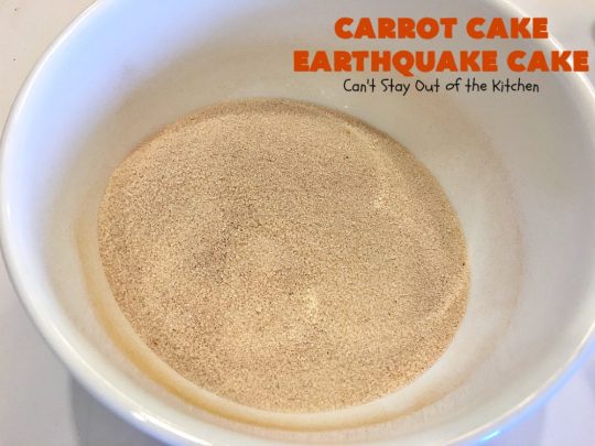 Carrot Cake Earthquake Cake | Can't Stay Out of the Kitchen | this fantastic #cake is rich, decadent & divine! It's layered with #pecans, #coconut, vanilla chips & uses a boxed #carrotcake mix. Then it has a #cheesecake icing layer that sinks into the #dessert while baking. The explosion causes an earthquake! Amazing dessert for company or #holidays.