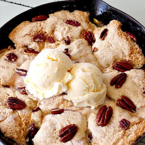 Cast Iron Peach Cobbler | Can't Stay Out of the Kitchen | this quick and easy #recipe has a fresh #peach filling & a topping with salted, roasted #pecans. So quick to make & delicious to the taste buds. Terrific served with ice cream. #PeachCobbler #summer #southern #SummerDessert #PeachDessert #cobbler #CastIronPeachCobbler #Canbassador #WashingtonStateFruitCommission #WashingtonStoneFruitGrowers #WashingtonStateStoneFruitGrowers