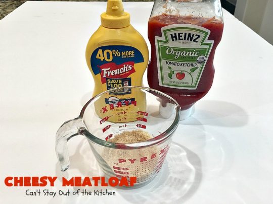 Cheesy Meatloaf | Can't Stay Out of the Kitchen | This amazing #meatloaf is filled with #cheddarcheese & topped with a #ketchup, mustard & brown sugar topping. This #glutenfree #entree uses #oatmeal & GF bread crumbs. #beef #groundbeef