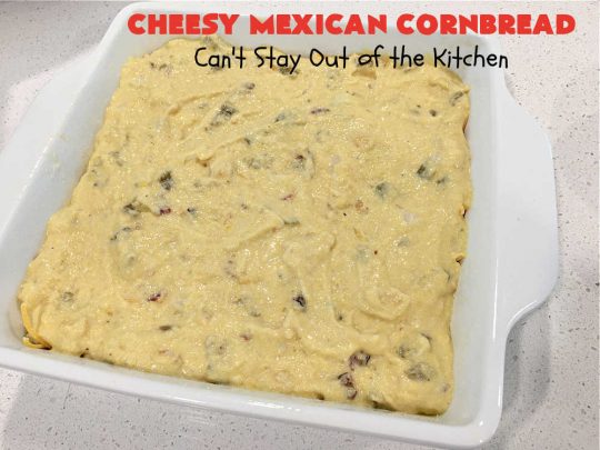 Cheesy Mexican Cornbread | Can't Stay Out of the Kitchen | this delectable & savory #cornbread includes #bacon, a layer of #CheddarCheese, & #GreenChilies to give it a little punch. It pairs wonderfully with soup or chili. Buttermilk & sour cream keep it moist so it doesn't crumble when you're eating it. Great side for any occasion. #TexMex #CheesyMexicanCornbread