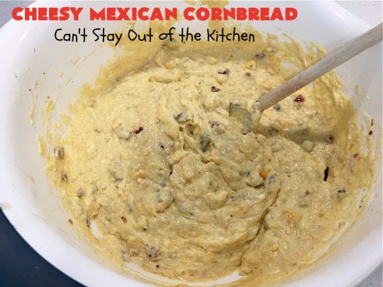 Cheesy Mexican Cornbread | Can't Stay Out of the Kitchen | this delectable & savory #cornbread includes #bacon, a layer of #CheddarCheese, & #GreenChilies to give it a little punch. It pairs wonderfully with soup or chili. Buttermilk & sour cream keep it moist so it doesn't crumble when you're eating it. Great side for any occasion. #TexMex #CheesyMexicanCornbread