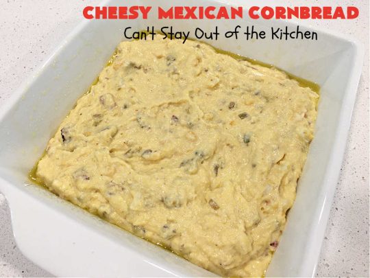 Cheesy Mexican Cornbread | Can't Stay Out of the Kitchen | this delectable & savory #cornbread includes #bacon, a layer of #CheddarCheese, & #GreenChilies to give it a little punch. It pairs wonderfully with soup or chili. Buttermilk & sour cream keep it moist so it doesn't crumble when you're eating it. Great side for any occasion. #TexMex #CheesyMexicanCornbread