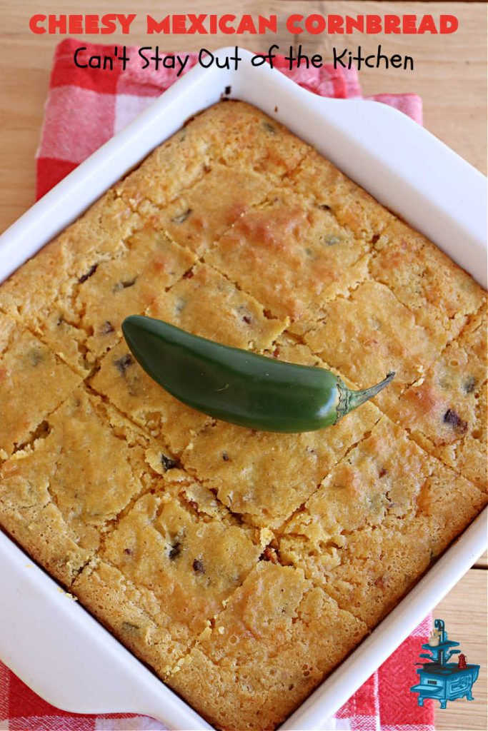 Cheesy Mexican Cornbread | Can't Stay Out of the Kitchen | this delectable & savory #cornbread includes #bacon, a layer of #CheddarCheese, & #GreenChilies to give it a little punch. It pairs wonderfully with soup or chili. Buttermilk & sour cream keep it moist so it doesn't crumble when you're eating it. Great side for any occasion. #TexMex #CheesyMexicanCornbreadCheesy Mexican Cornbread | Can't Stay Out of the Kitchen | this delectable & savory #cornbread includes #bacon, a layer of #CheddarCheese, & #GreenChilies to give it a little punch. It pairs wonderfully with soup or chili. Buttermilk & sour cream keep it moist so it doesn't crumble when you're eating it. Great side for any occasion. #TexMex #CheesyMexicanCornbread
