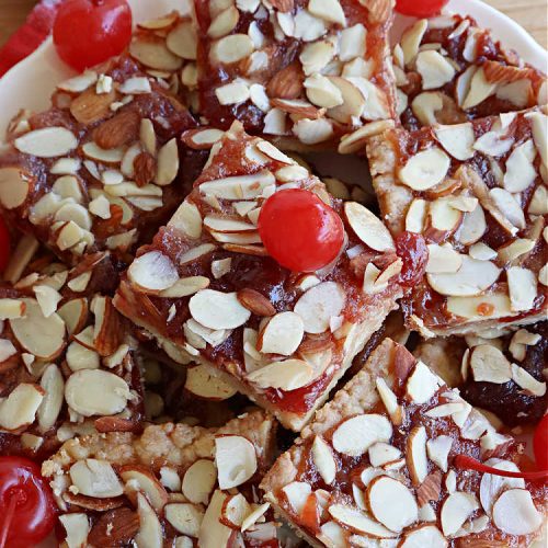 Cherry Almond Bars | Can't Stay Out of the Kitchen | these fantastic #Cherry #cookies use a #shortbread crust, #CherryPreserves in the filling & then they're topped with #almonds for a scrumptious treat everyone will enjoy. Great for #tailgating parties, #holiday #baking & a #ChristmasCookieExchange. #dessert #CherryDessert #CherryAlmondBars