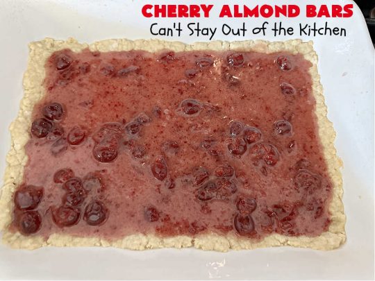 Cherry Almond Bars | Can't Stay Out of the Kitchen | these fantastic #Cherry #cookies use a #shortbread crust, #CherryPreserves in the filling & then they're topped with #almonds for a scrumptious treat everyone will enjoy. Great for #tailgating parties, #holiday #baking & a #ChristmasCookieExchange. #dessert #CherryDessert #CherryAlmondBars