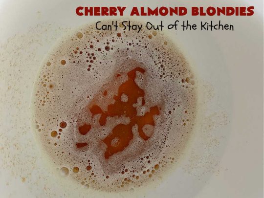 Cherry Almond Blondies | Can't Stay Out of the Kitchen | You'll be swooning from the first bite of these luscious bar-type #cookies. Browned butter in the cookie as well as the icing sets these #blondies apart. They're rich, decadent & so heavenly they'll cure any sweet tooth craving. Great for #tailgating parties & potlucks. #cherries #almonds #VanillaChips #CherryAlmondBlondies
