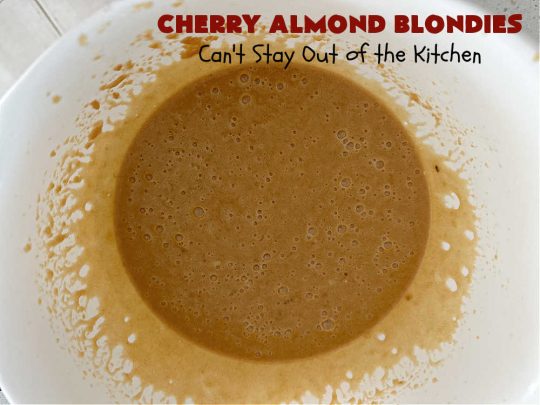Cherry Almond Blondies | Can't Stay Out of the Kitchen | You'll be swooning from the first bite of these luscious bar-type #cookies. Browned butter in the cookie as well as the icing sets these #blondies apart. They're rich, decadent & so heavenly they'll cure any sweet tooth craving. Great for #tailgating parties & potlucks. #cherries #almonds #VanillaChips #CherryAlmondBlondies