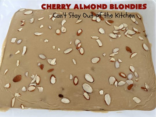 Cherry Almond Blondies | Can't Stay Out of the Kitchen | You'll be swooning from the first bite of these luscious bar-type #cookies. Browned butter in the cookie as well as the icing sets these #blondies apart. They're rich, decadent & so heavenly they'll cure any sweet tooth craving. Great for #tailgating parties & potlucks. #cherries #almonds #VanillaChips #CherryAlmondBlondies