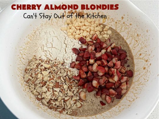 Cherry Almond Blondies | Can't Stay Out of the Kitchen | You'll be swooning from the first bite of these luscious bar-type #cookies. Browned butter in the cookie as well as the icing sets these #blondies apart. They're rich, decadent & so heavenly they'll cure any sweet tooth craving. Great for #tailgating parties & potlucks. #cherries #almonds #VanillaChips #CherryAlmondBlondies