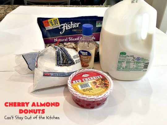 Cherry Almond Donuts | Can't Stay Out of the Kitchen | these luscious #donuts are filled with #cherries & #almond extract. They're glazed with an almond-flavored powdered sugar icing & topped with chopped cherries. Perfect for #ValentinesDay or any #holiday #breakfast. #HolidayBreakfast #ValentinesDayBreakfast #CherryDonuts #CherryAlmondDonuts 
