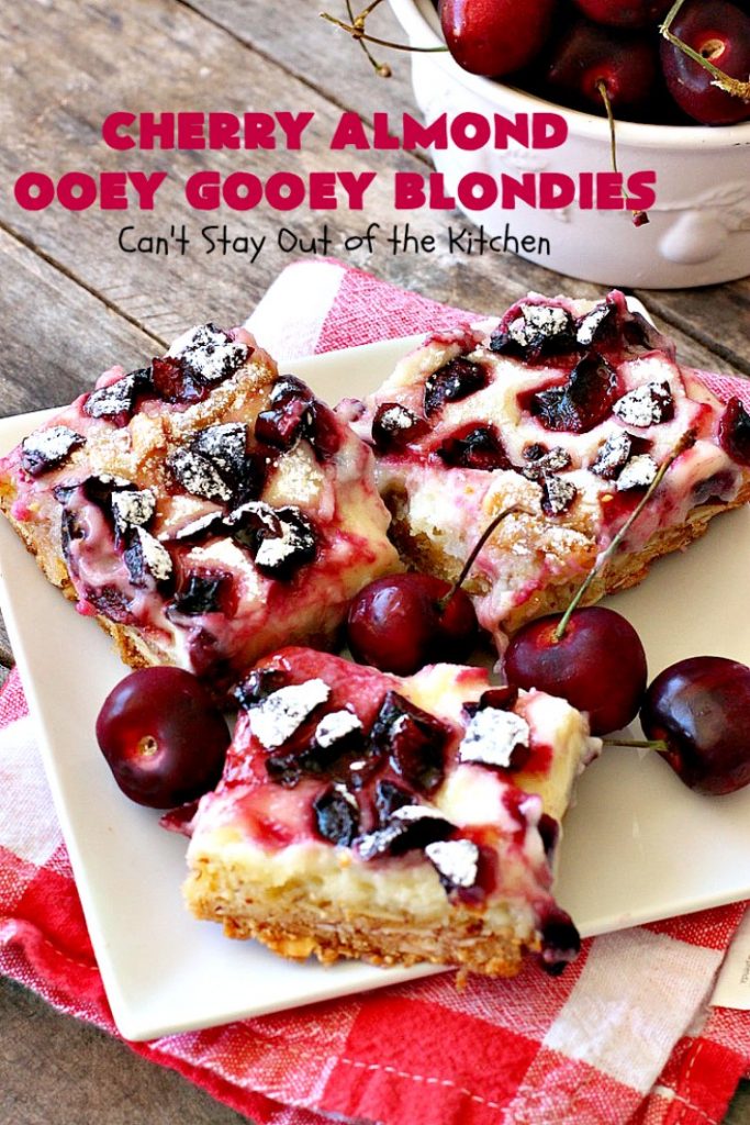 Cherry Almond Ooey Gooey Blondies | Can't Stay Out of the Kitchen | Best #cherry #dessert ever! These fabulous #cookies have a #cheesecake filling, topped with fresh #cherries & powdered sugar. They are absolutely heavenly. #almonds #cherrydessert #Canbassador #NorthwestCherryGrowers