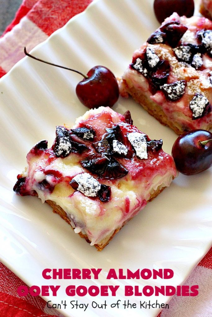 Cherry Almond Ooey Gooey Blondies | Can't Stay Out of the Kitchen | Best #cherry #dessert ever! These fabulous #cookies have a #cheesecake filling, topped with fresh #cherries & powdered sugar. They are absolutely heavenly. #almonds #cherrydessert #Canbassador #NorthwestCherryGrowers