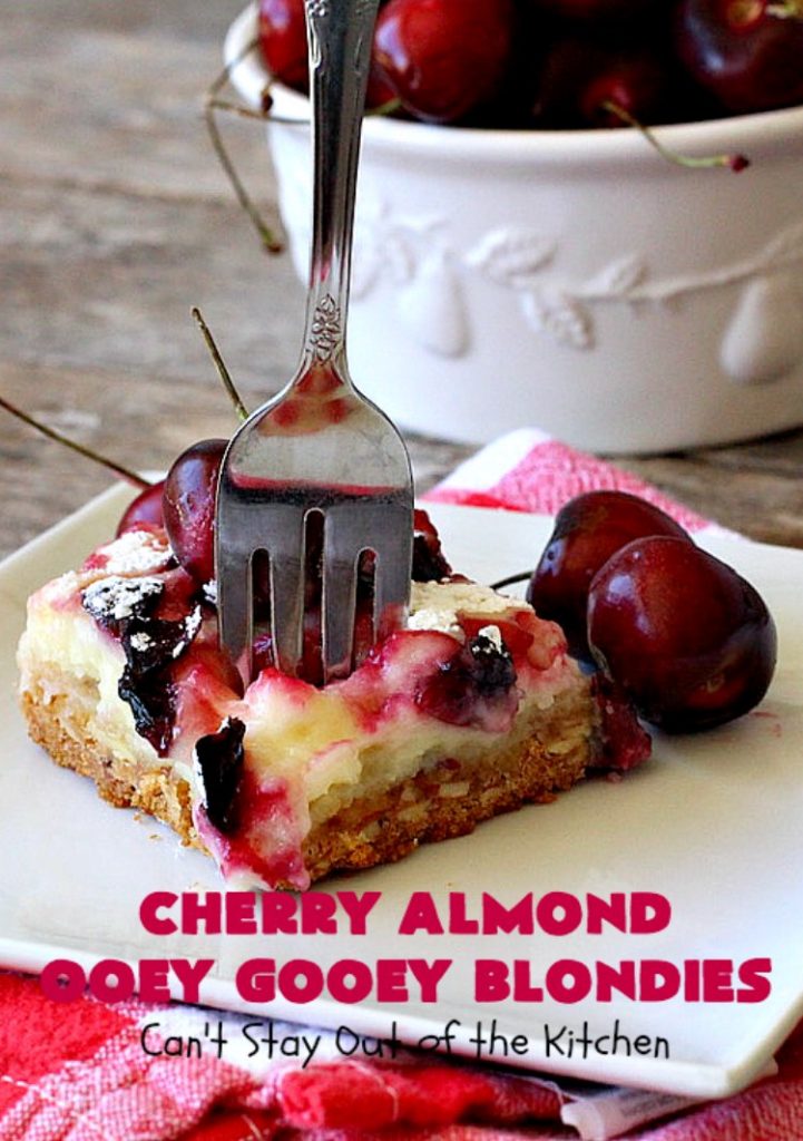 Cherry Almond Ooey Gooey Blondies | Can't Stay Out of the Kitchen | Best #cherry #dessert ever! These fabulous #cookies have a #cheesecake filling, topped with fresh #cherries & powdered sugar. They are absolutely heavenly. #almonds #cherrydessert #Canbassador #NorthwestCherryGrowers