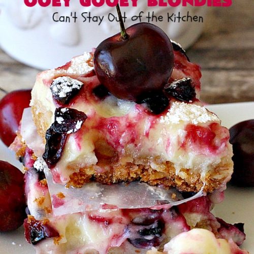 Cherry Almond Ooey Gooey Blondies | Can't Stay Out of the Kitchen | Best #cherry #dessert ever! These fabulous #cookies have a #cheesecake filling, topped with fresh #cherries & powdered sugar. They are absolutely heavenly. #almonds #cherrydessert #Canbassador #NorthwestCherryGrowers
