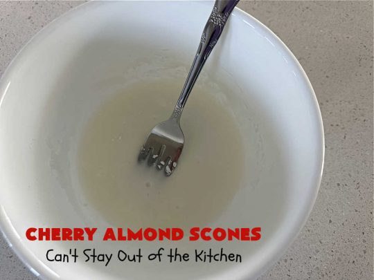 Cherry Almond Scones | Can't Stay Out of the Kitchen | #CherryAlmondScones are outrageously good & terrific for any kind of company or #holiday #breakfast like #Thanksgiving, #Christmas or #ValentinesDay. These #scones are filled with #cherries, #AlmondExtract & #almonds & glazed with a luscious #almond icing. Every bite will have you swooning! #HolidayBreakfast