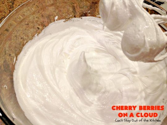 Cherry Berries On A Cloud | Can't Stay Out of the Kitchen | Prepare to wow your guests with this awesome, decadent #dessert! It has a meringue crust, #cheesecake layer with #marshmallows & topped with a #cherry & #strawberry glaze. It's perfect for #holidays like #Christmas, #ValentinesDay or special occasions.