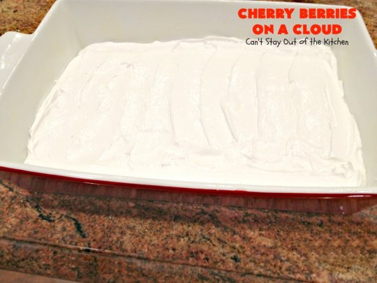 Cherry Berries On A Cloud | Can't Stay Out of the Kitchen | Prepare to wow your guests with this awesome, decadent #dessert! It has a meringue crust, #cheesecake layer with #marshmallows & topped with a #cherry & #strawberry glaze. It's perfect for #holidays like #Christmas, #ValentinesDay or special occasions.