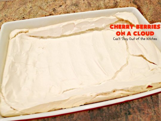 Cherry Berries On A Cloud | Can't Stay Out of the Kitchen | Prepare to wow your guests with this awesome, decadent #dessert! It has a meringue crust, #cheesecake layer with #marshmallows & topped with a #cherry & #strawberry glaze. It's perfect for #holidays like #Christmas, #ValentinesDay or special occasions.