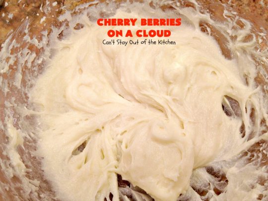 Cherry Berries On A Cloud | Can't Stay Out of the Kitchen | Prepare to wow your guests with this awesome, decadent #dessert! It has a meringue crust, #cheesecake layer with #marshmallows & topped with a #cherry & #strawberry glaze. It's perfect for #holidays like #Christmas, #ValentinesDay or special occasions.