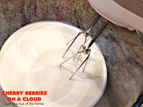 Cherry Berries On A Cloud | Can't Stay Out of the Kitchen | Prepare to wow your guests with this awesome, decadent #dessert! It has a meringue crust, #cheesecake layer with #marshmallows & topped with a #cherry & #strawberry glaze. It's perfect for #holidays like #Christmas, #ValentinesDay or special occasions.