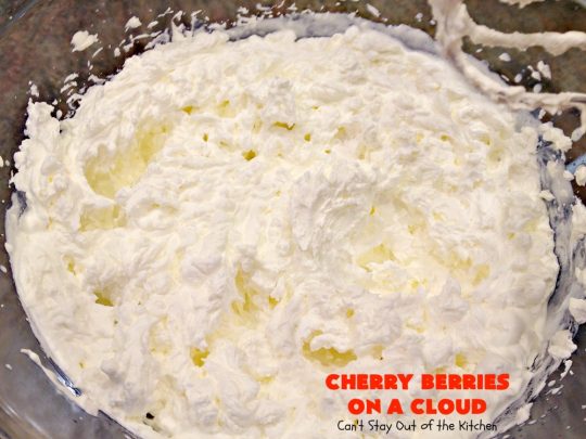 Cherry Berries On A Cloud | Can't Stay Out of the Kitchen | Prepare to wow your guests with this awesome, decadent #dessert! It has a meringue crust, #cheesecake layer with #marshmallows & topped with a #cherry & #strawberry glaze. It's perfect for #holidays like #Christmas, #ValentinesDay or special occasions.
