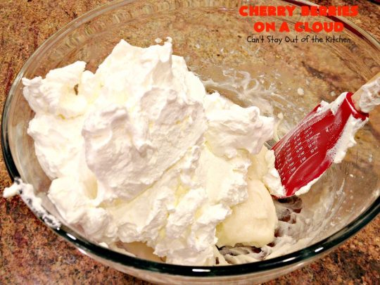 Cherry Berries On A Cloud | Can't Stay Out of the Kitchen | Prepare to wow your guests with this awesome, decadent #dessert! It has a meringue crust, #cheesecake layer with #marshmallows & topped with a #cherry & #strawberry glaze. It's perfect for #holidays like #Christmas, #ValentinesDay or special occasions.