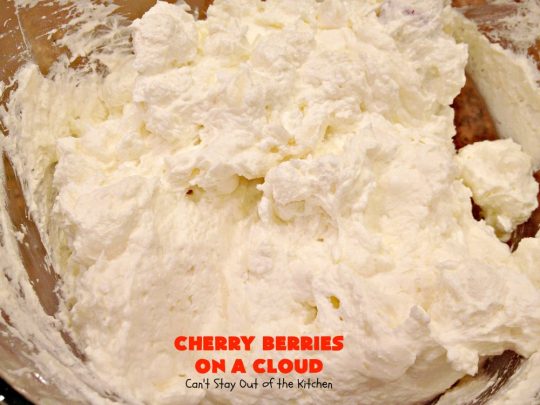 Cherry Berries On A Cloud | Can't Stay Out of the Kitchen | Prepare to wow your guests with this awesome, decadent #dessert! It has a meringue crust, #cheesecake layer with #marshmallows & topped with a #cherry & #strawberry glaze. It's perfect for #holidays like #Christmas, #ValentinesDay or special occasions.