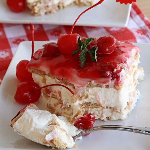Cherry Cheesecake Éclair Dessert | Can't Stay Out of the Kitchen | this is an awesome #dessert to wow your family, friends and company for any social gathering. It's a #SixIngredientRecipe & easily whipped up in about 10 minutes. This #CherryDessert will have you swooning from the first bite. #ÉclairDessert #CherryCheesecakeÉclairDessert #Éclairs #CherryPieFilling #Cheesecake #CheesecakePuddingMix