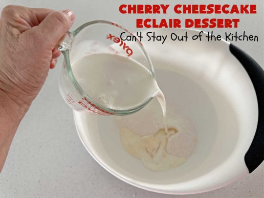 Cherry Cheesecake Éclair Dessert | Can't Stay Out of the Kitchen | this is an awesome #dessert to wow your family, friends and company for any social gathering. It's a #SixIngredientRecipe & easily whipped up in about 10 minutes. This #CherryDessert will have you swooning from the first bite. #ÉclairDessert #CherryCheesecakeÉclairDessert #Éclairs #CherryPieFilling #Cheesecake #CheesecakePuddingMix