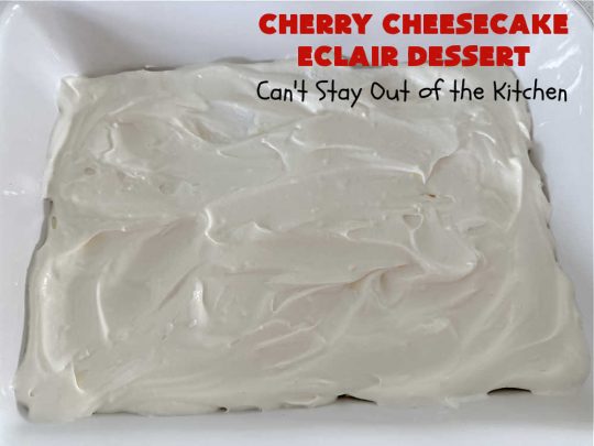 Cherry Cheesecake Éclair Dessert | Can't Stay Out of the Kitchen | this is an awesome #dessert to wow your family, friends and company for any social gathering. It's a #SixIngredientRecipe & easily whipped up in about 10 minutes. This #CherryDessert will have you swooning from the first bite. #ÉclairDessert #CherryCheesecakeÉclairDessert #Éclairs #CherryPieFilling #Cheesecake #CheesecakePuddingMix