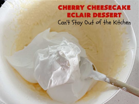 Cherry Cheesecake Éclair Dessert | Can't Stay Out of the Kitchen | this is an awesome #dessert to wow your family, friends and company for any social gathering. It's a #SixIngredientRecipe & easily whipped up in about 10 minutes. This #CherryDessert will have you swooning from the first bite. #ÉclairDessert #CherryCheesecakeÉclairDessert #Éclairs #CherryPieFilling #Cheesecake #CheesecakePuddingMix