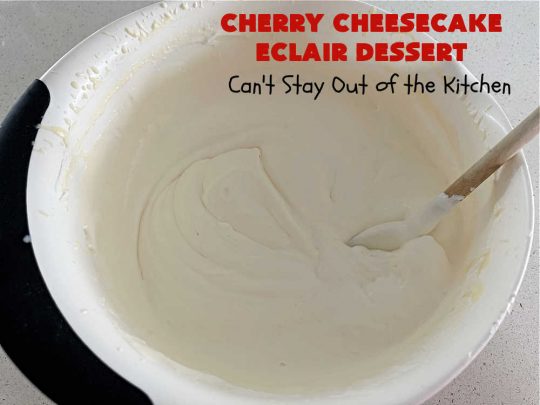 Cherry Cheesecake Éclair Dessert | Can't Stay Out of the Kitchen | this is an awesome #dessert to wow your family, friends and company for any social gathering. It's a #SixIngredientRecipe & easily whipped up in about 10 minutes. This #CherryDessert will have you swooning from the first bite. #ÉclairDessert #CherryCheesecakeÉclairDessert #Éclairs #CherryPieFilling #Cheesecake #CheesecakePuddingMix