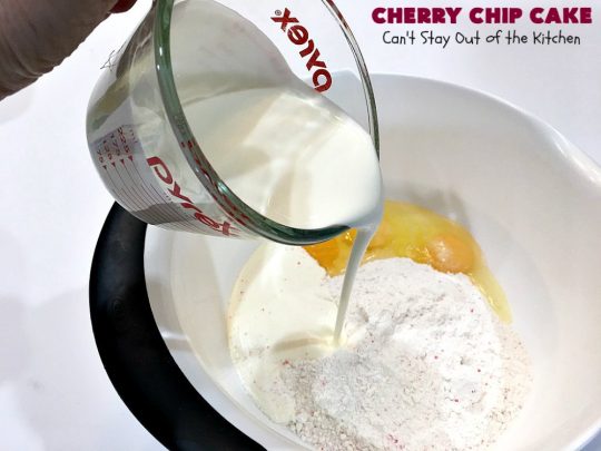 Cherry Chip Cake | Can't Stay Out of the Kitchen | this #dessert is rich & decadent. It uses #FreshCherries & #VanillaChips which dissolve into the #cake while #baking. The flavors of #cherry & #vanilla just pop in this heavenly cake. Make it now while #cherries are in season! #CakeMix #CherryChipCake #CherryChipCakeMix #CherryDessert #FreshCherryCake #Canbassador #NWCherries #NorthwestCherryGrowers