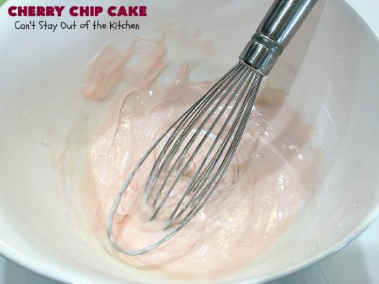 Cherry Chip Cake | Can't Stay Out of the Kitchen | this #dessert is rich & decadent. It uses #FreshCherries & #VanillaChips which dissolve into the #cake while #baking. The flavors of #cherry & #vanilla just pop in this heavenly cake. Make it now while #cherries are in season! #CakeMix #CherryChipCake #CherryChipCakeMix #CherryDessert #FreshCherryCake #Canbassador #NWCherries #NorthwestCherryGrowers
