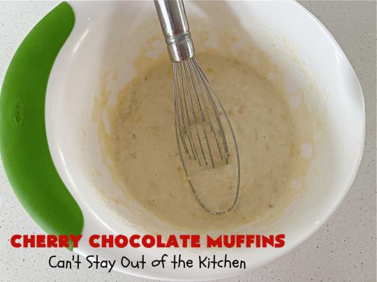 Cherry Chocolate Muffins | Can't Stay Out of the Kitchen | Every sweet tooth craving will be satisfied by one bite of these sensational #muffins. They're filled with #CandiedCherries & miniature #ChocolateChips. #Bananas & #applesauce keep the muffins moist. They're perfect for any #brunch or #breakfast #menu, as snacks to take to sports practices, for #tailgating parties or #potlucks. Everyone will want seconds. #chocolate #cherries #holiday #CherryMuffins #HolidayBreakfast #ChocolateMuffins #CherryChocolateMuffins