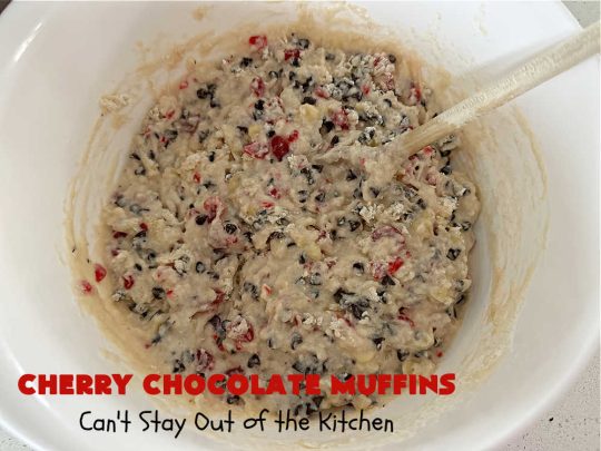 Cherry Chocolate Muffins | Can't Stay Out of the Kitchen | Every sweet tooth craving will be satisfied by one bite of these sensational #muffins. They're filled with #CandiedCherries & miniature #ChocolateChips. #Bananas & #applesauce keep the muffins moist. They're perfect for any #brunch or #breakfast #menu, as snacks to take to sports practices, for #tailgating parties or #potlucks. Everyone will want seconds. #chocolate #cherries #holiday #CherryMuffins #HolidayBreakfast #ChocolateMuffins #CherryChocolateMuffins