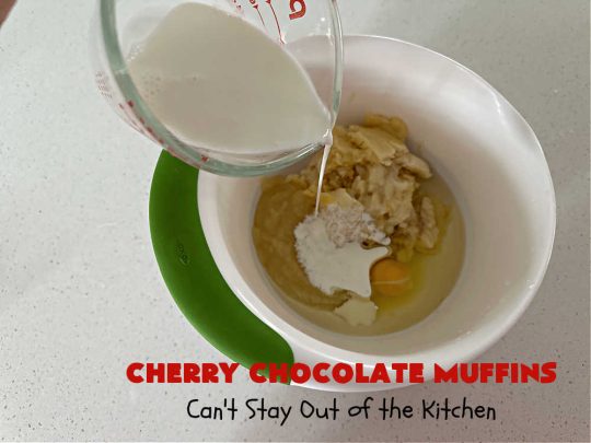Cherry Chocolate Muffins | Can't Stay Out of the Kitchen | Every sweet tooth craving will be satisfied by one bite of these sensational #muffins. They're filled with #CandiedCherries & miniature #ChocolateChips. #Bananas & #applesauce keep the muffins moist. They're perfect for any #brunch or #breakfast #menu, as snacks to take to sports practices, for #tailgating parties or #potlucks. Everyone will want seconds. #chocolate #cherries #holiday #CherryMuffins #HolidayBreakfast #ChocolateMuffins #CherryChocolateMuffins