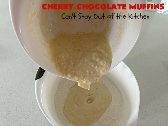 Cherry Chocolate Muffins | Can't Stay Out of the Kitchen | Every sweet tooth craving will be satisfied by one bite of these sensational #muffins. They're filled with #CandiedCherries & miniature #ChocolateChips. #Bananas & #applesauce keep the muffins moist. They're perfect for any #brunch or #breakfast #menu, as snacks to take to sports practices, for #tailgating parties or #potlucks. Everyone will want seconds. #chocolate #cherries #holiday #CherryMuffins #HolidayBreakfast #ChocolateMuffins #CherryChocolateMuffins