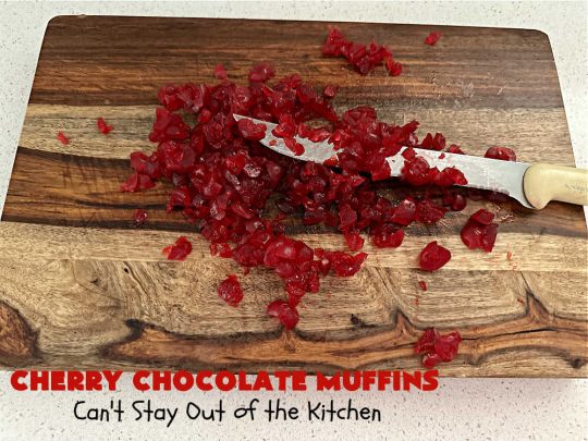 Cherry Chocolate Muffins | Can't Stay Out of the Kitchen | Every sweet tooth craving will be satisfied by one bite of these sensational #muffins. They're filled with #CandiedCherries & miniature #ChocolateChips. #Bananas & #applesauce keep the muffins moist. They're perfect for any #brunch or #breakfast #menu, as snacks to take to sports practices, for #tailgating parties or #potlucks. Everyone will want seconds. #chocolate #cherries #holiday #CherryMuffins #HolidayBreakfast #ChocolateMuffins #CherryChocolateMuffins