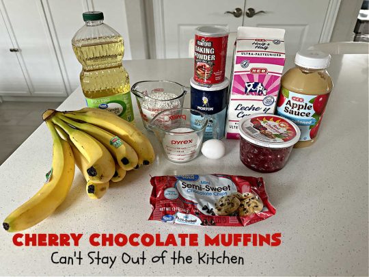Cherry Chocolate Muffins | Can't Stay Out of the Kitchen | Every sweet tooth craving will be satisfied by one bite of these sensational #muffins. They're filled with #CandiedCherries & miniature #ChocolateChips. #Bananas & #applesauce keep the muffins moist. They're perfect for any #brunch or #breakfast #menu, as snacks to take to sports practices, for #tailgating parties or #potlucks. Everyone will want seconds. #chocolate #cherries #holiday #CherryMuffins #HolidayBreakfast #ChocolateMuffins #CherryChocolateMuffins